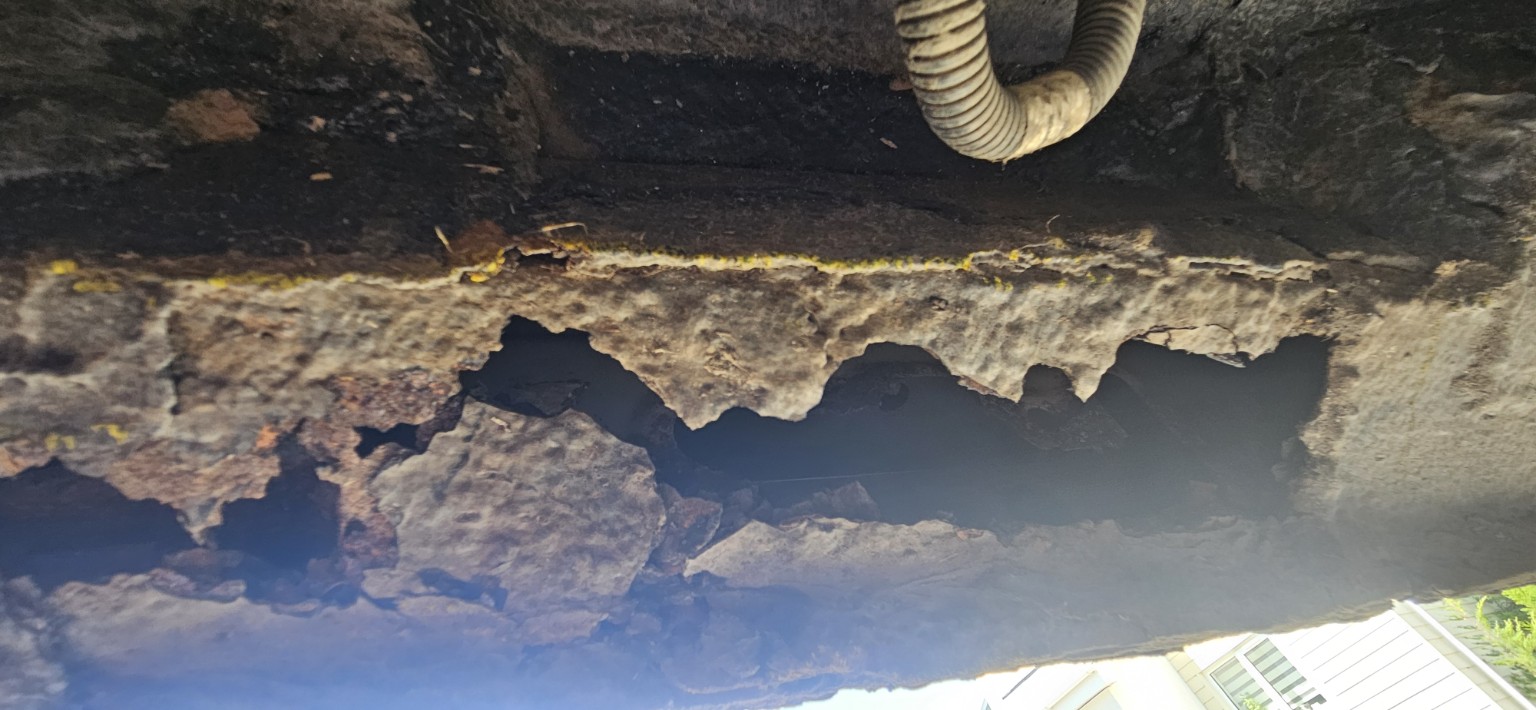Major rail perforation beneath coating
